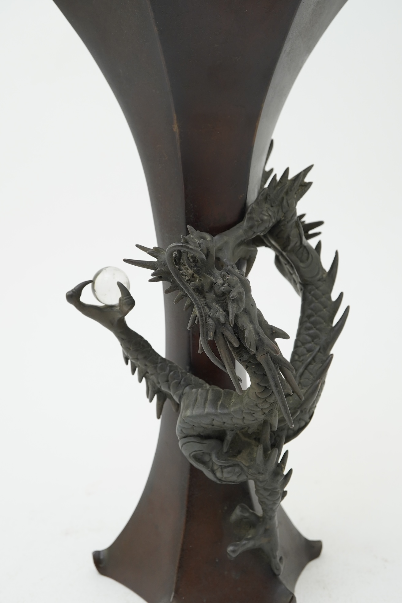 A Japanese bronze 'dragon' hexagonal beaker vase, Meiji period